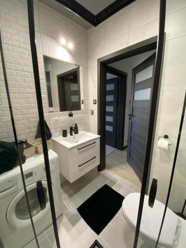 Kylpyhuone majoituspaikassa ST TOWER Apartament