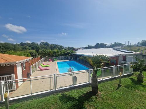 an aerial view of a house with a swimming pool at Les Villas de Boisvin in Le Moule