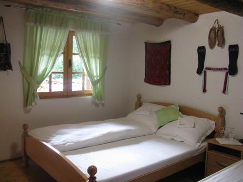 Postel nebo postele na pokoji v ubytování Apartments Izvor Lisine