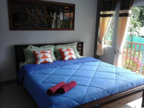 Postel nebo postele na pokoji v ubytování Samed Thanee