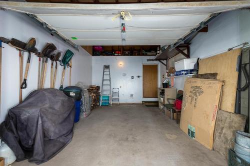 a garage with a room with a lot of stuff at Agate Bay Ranch in Carnelian Bay