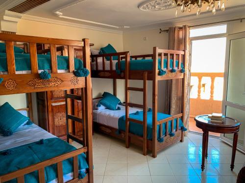 Postel nebo postele na pokoji v ubytování Surf appartement tamraght 2