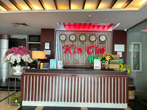 a restaurant with a bar with a korean sign on it at Kim Tho Hotel in Can Tho