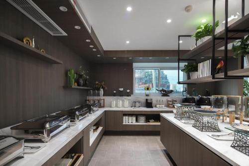 A cozinha ou cozinha compacta de Hanting Premium Hotel Nanjing High-tech Zone Xuefu Road