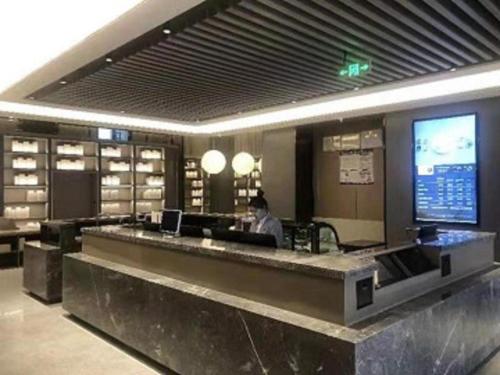 O saguão ou recepção de Ji Hotel Yantai International Expo Center