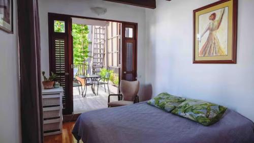Tempat tidur dalam kamar di Caribe Rentals