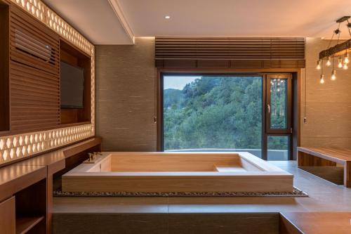 Postel nebo postele na pokoji v ubytování Yeonhwamun Hotel Yeongdeok