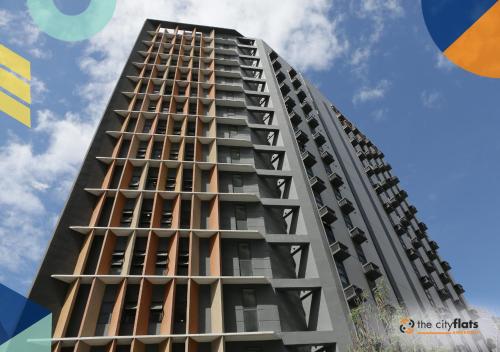 a rendering of the apartment building at The City Flats Amorsolo in Manila