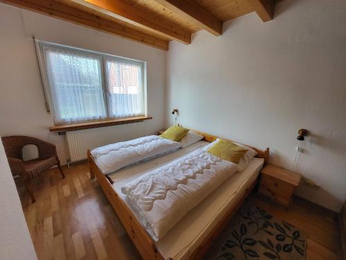 Ένα ή περισσότερα κρεβάτια σε δωμάτιο στο Ferienhaus Bella