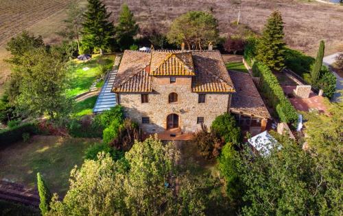 an aerial view of a large stone house at Relais La Martina in Pietraviva