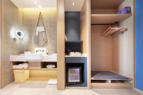 Ένα μπάνιο στο Atour Hotel Shenzhen Longgang Buji Lilang