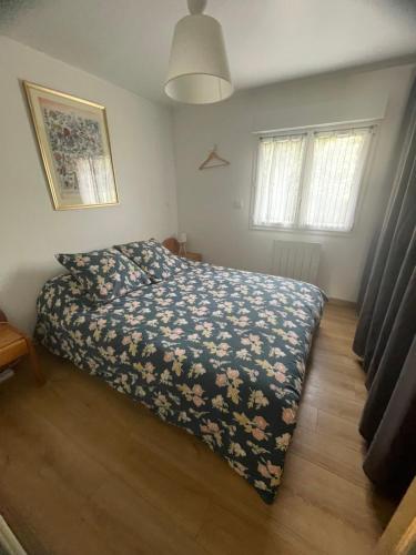Posteľ alebo postele v izbe v ubytovaní Cosy Giverny