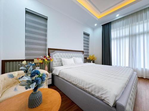 Tempat tidur dalam kamar di Phượng Hoàng villa