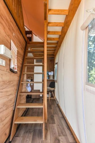 a staircase in a tiny house at The Park - Silang in Silang