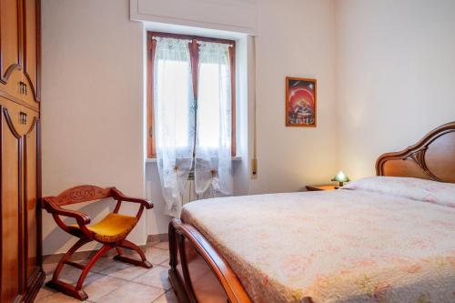 Postel nebo postele na pokoji v ubytování Casa marina Ampio - Castiglione
