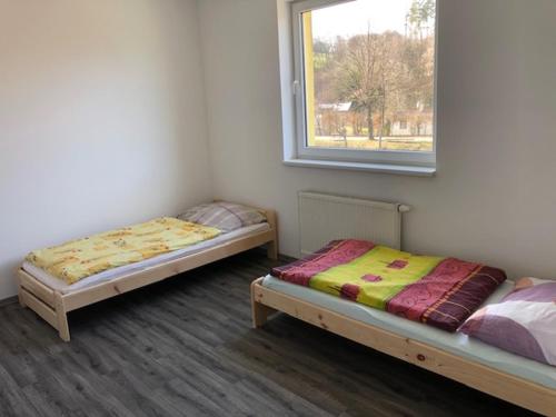 Кровать или кровати в номере UBYTOVNA SK Posázavan Poříčí nad Sázavou