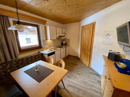 Et tv og/eller underholdning på Apartment Seespitz