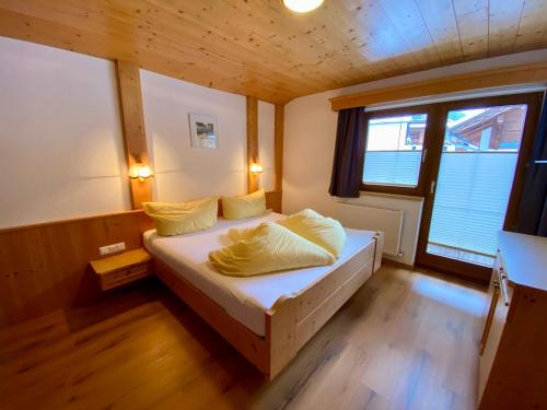 En eller flere senge i et værelse på Apartment Seespitz