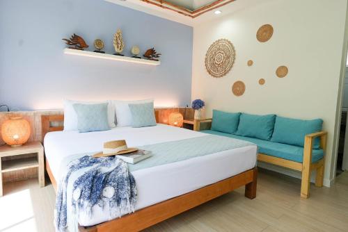 Postel nebo postele na pokoji v ubytování Arkbar Beach Club & Resort