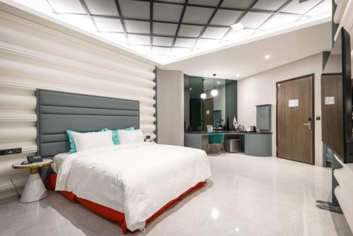 Cama o camas de una habitación en 禾楓覓月文旅