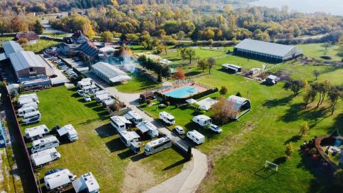 an aerial view of a parking lot with parked vehicles at Villa Betula Resort & Camping in Žiar