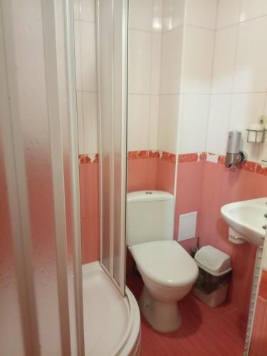 Un baño de Арніка