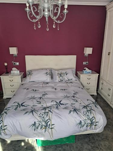 Ένα ή περισσότερα κρεβάτια σε δωμάτιο στο Casa Paloma