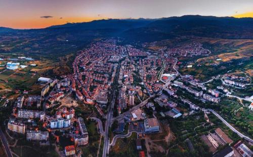 an aerial view of a city at sunset at Apart 8 in Sandanski
