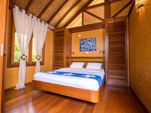 Katil atau katil-katil dalam bilik di Oasis de Tendéa - Bali à Farino