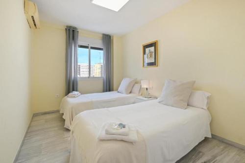Posteľ alebo postele v izbe v ubytovaní Apartamento en calle cuarteles de dos habitaciones