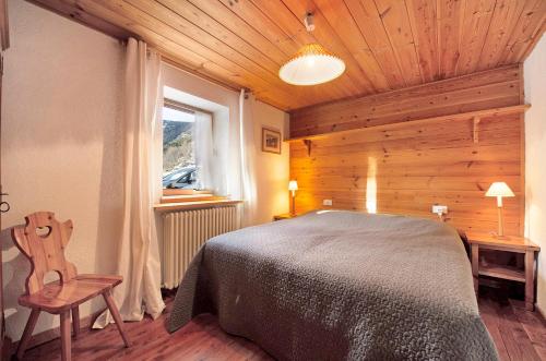 Säng eller sängar i ett rum på Bas vue Cervin Matterhorn Antey