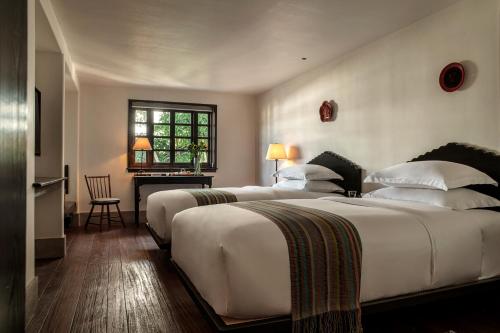 Cama o camas de una habitación en Anyu Hotel Dali