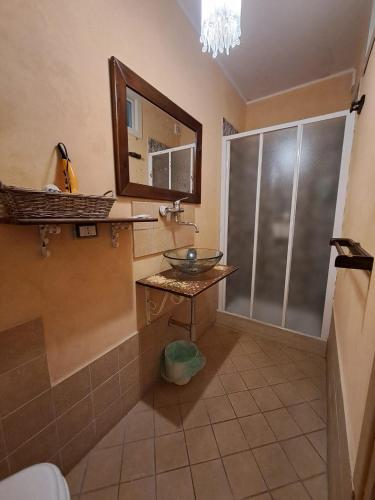 a bathroom with a sink and a mirror at Agriturismo Torre Flavia in Ladispoli