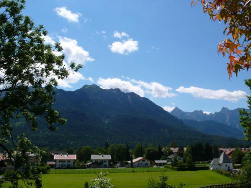 a view of a village with mountains in the background at Haus Antonia in Wallgau