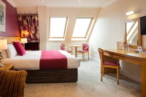 Voodi või voodid majutusasutuse Hotel Ceann Sibeal toas