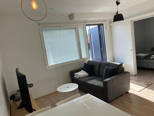 Posezení v ubytování Riverside cozy flat in Porvoo