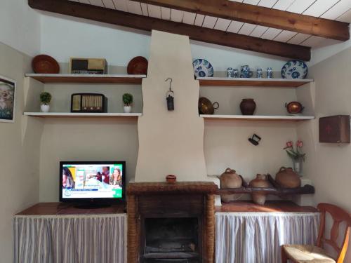 Una televisión o centro de entretenimiento en Casa Villazo I