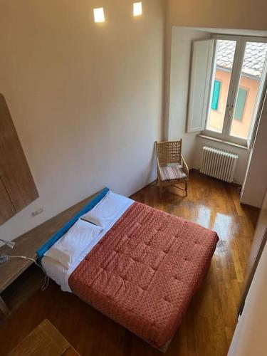 Postel nebo postele na pokoji v ubytování Appartamento a due passi dal duomo