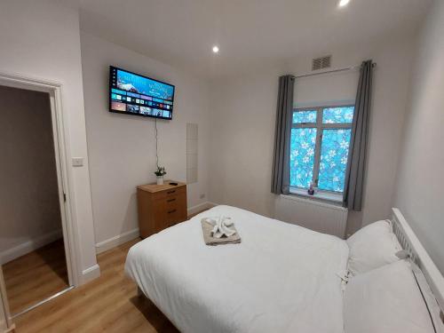 Cosy London Family apartment for 4 persons near Westfield Shepherd's Bush 객실 침대