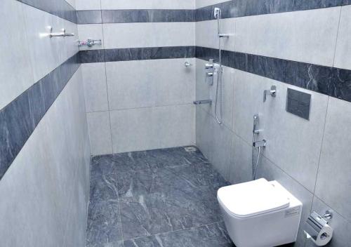 Koupelna v ubytování Whiteway Homestay