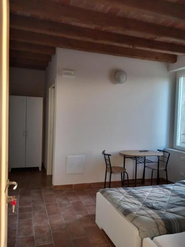 Postel nebo postele na pokoji v ubytování L'Antico Fienile Agriturismo