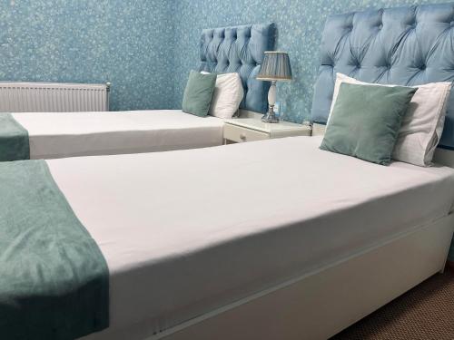 Ένα ή περισσότερα κρεβάτια σε δωμάτιο στο Address Boutique Hotel Baku