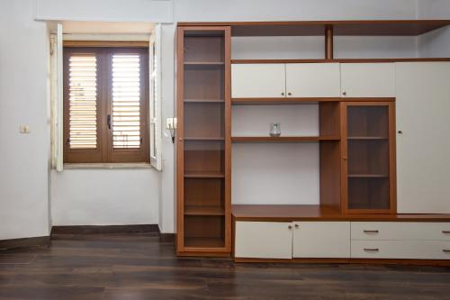 Η κουζίνα ή μικρή κουζίνα στο Casa D'alunzio-appartamento Rebiba