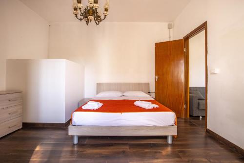 Ένα ή περισσότερα κρεβάτια σε δωμάτιο στο Casa D'alunzio-appartamento Rebiba