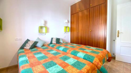 A bed or beds in a room at Bages