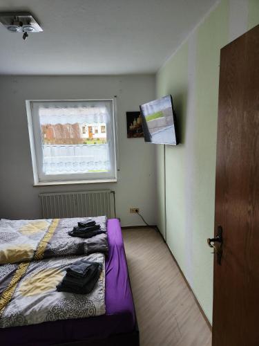 Katil atau katil-katil dalam bilik di Ferienwohnung Metz