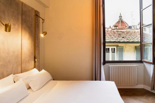 Postel nebo postele na pokoji v ubytování Renascentia in Florence - Adults Only