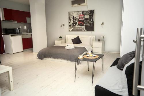 a bedroom with a bed and a table in it at Arkem Maltepe in Istanbul