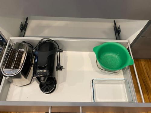 a drawer with some kitchen utensils in it at LA-Hüttenfeld Erdgeschoss Apartment in Hemsbach