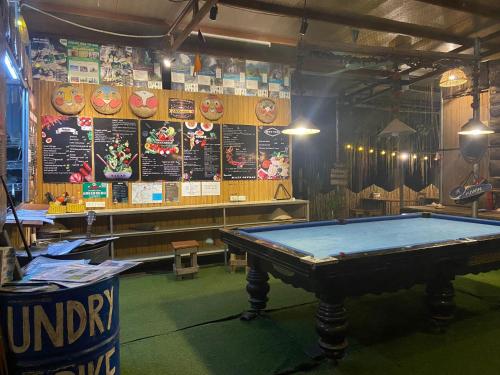 a ping pong table in a ping pong room at Hahaland in Phong Nha